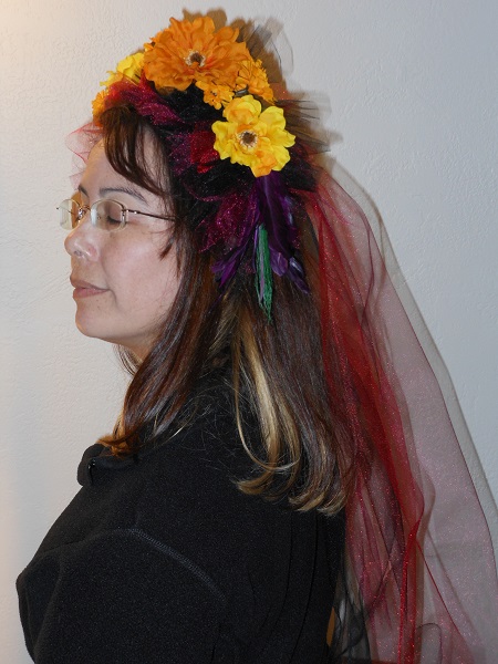 burgandy, red, black tulle with marigold flower headdress