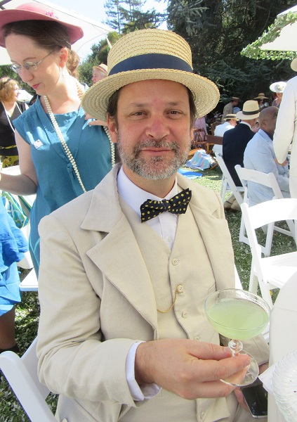 1920s Reproduction Linen Suit holding Chartreuse Cocktail