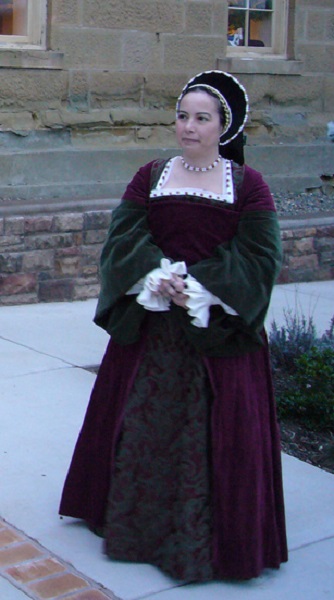 Reproduction Tudor Henrician Burgandy and Olive Lady's Gown. Photo and hat by Cate Jinemman.