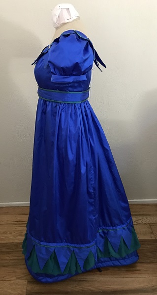 Reproduction 1820s Blue Dress with Van Dyke Points Left. 