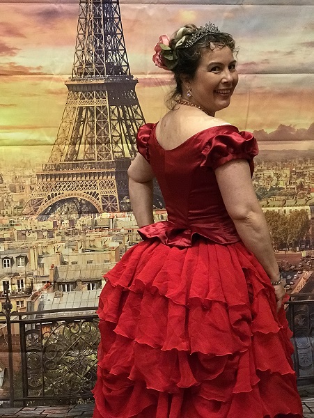 1870s Reproduction Red Bustle Dresses at the at Costume College 2018 social. 