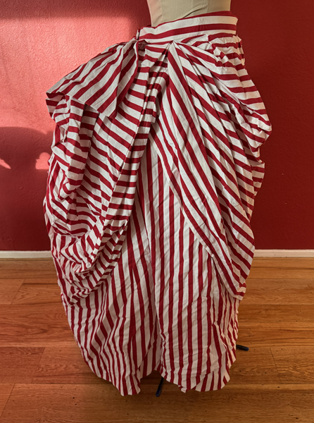 1887 Red Striped Overskirt Right. Truly Victorian TV367 