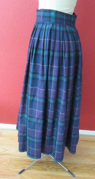 wool pleated plaid skirt. Left. 
