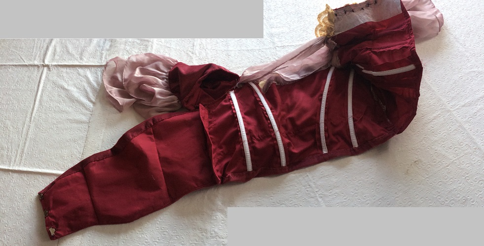 Inside view of 1900s Reproduction Raspberry Velvet Ball Gown Bodice. 